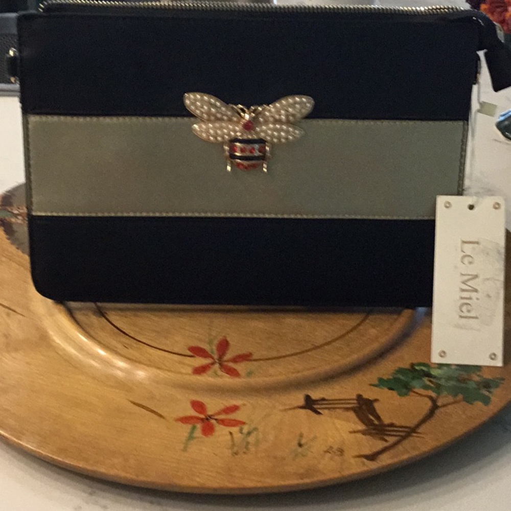 Black faux leather clutch